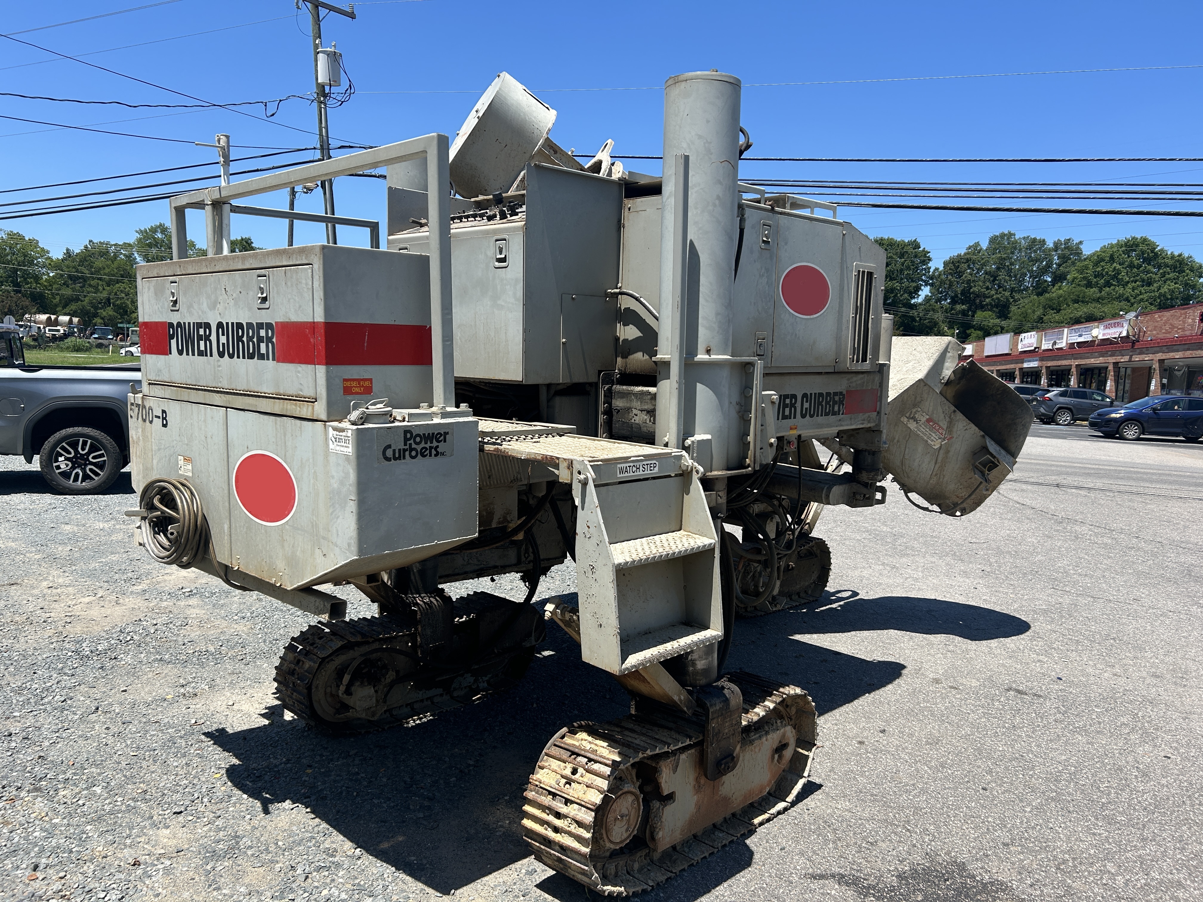Used 2002 Power Curbers 5700B Curb & Gutter machine with 4 Different Forms