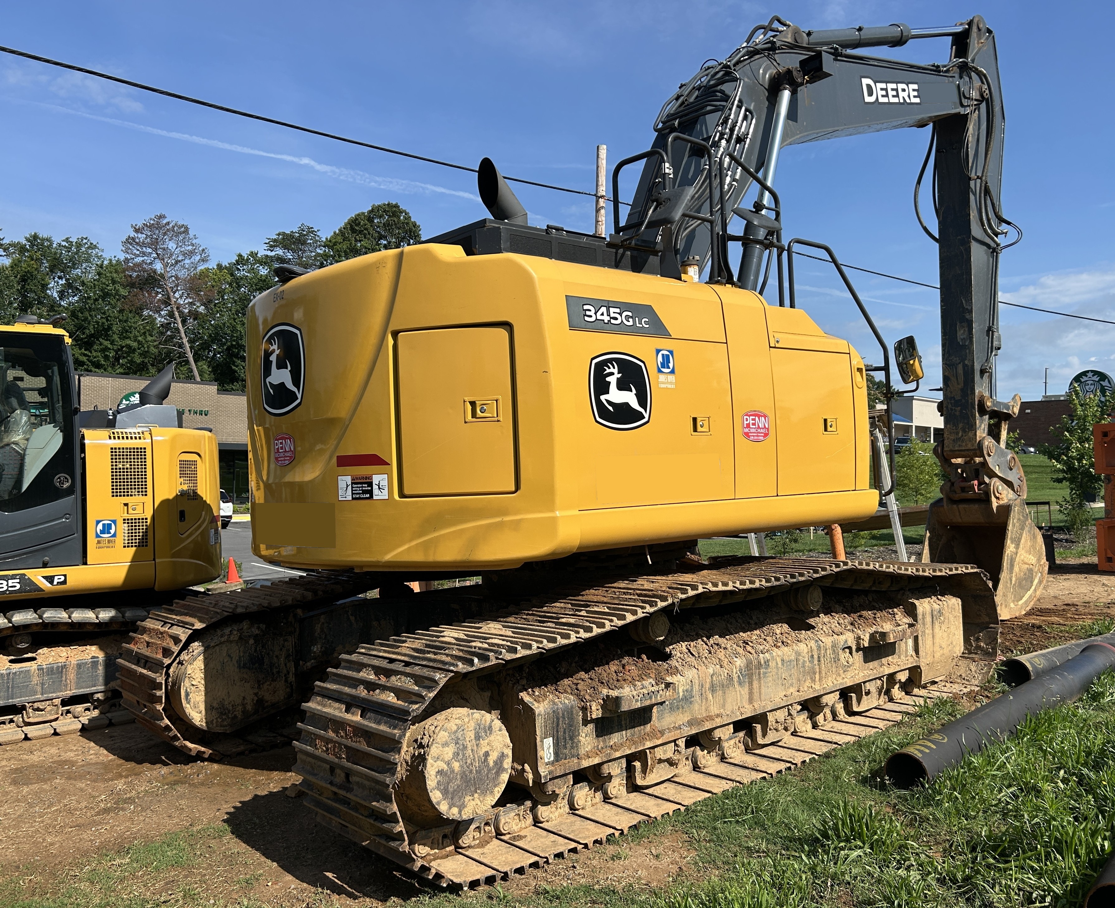 Used 2021 Deere 345G LC - low hours very nice
