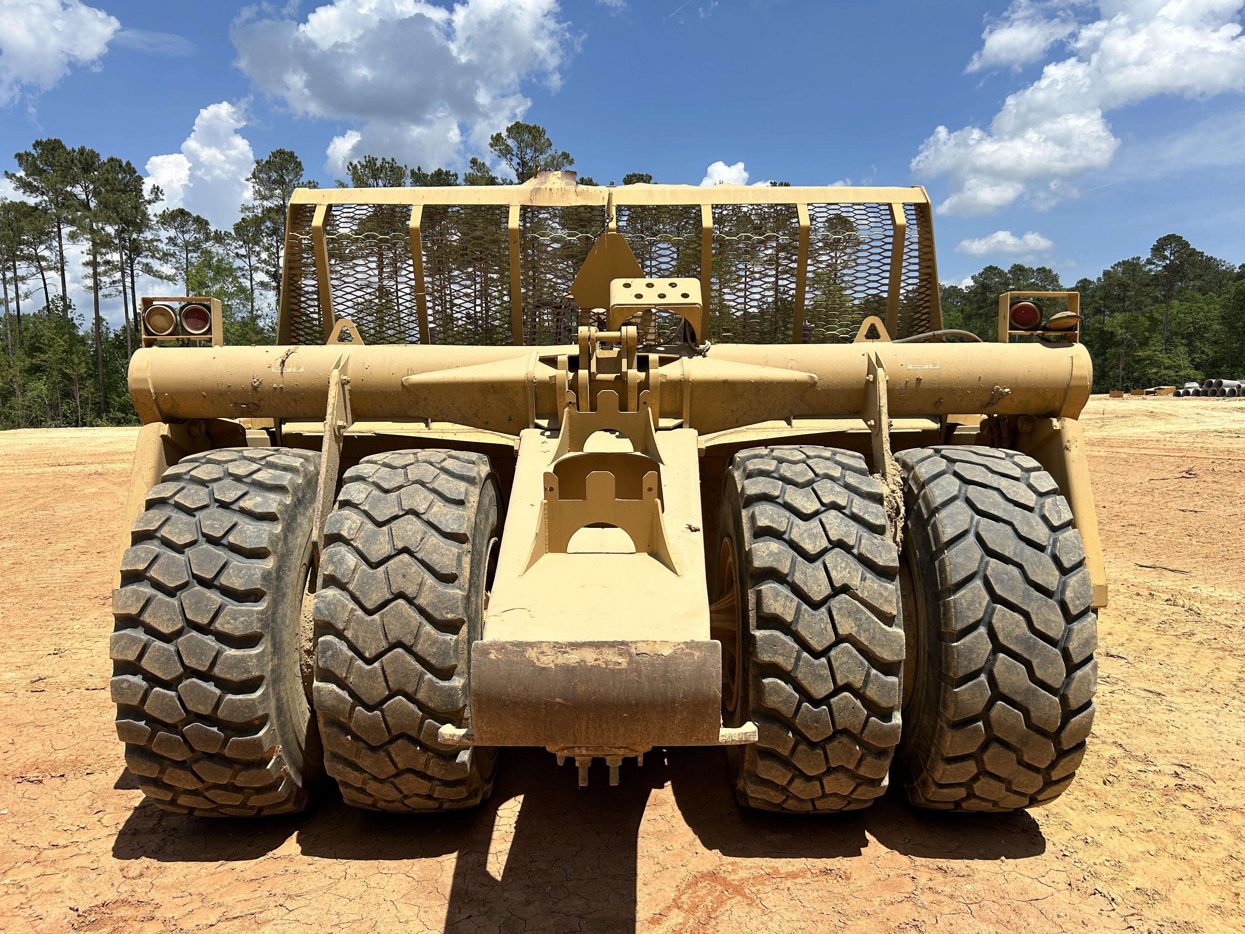 Used 2016 K-Tec K-Tec 1233 ADT scraper pulled by 2016 Bell B40D articulated dump truck