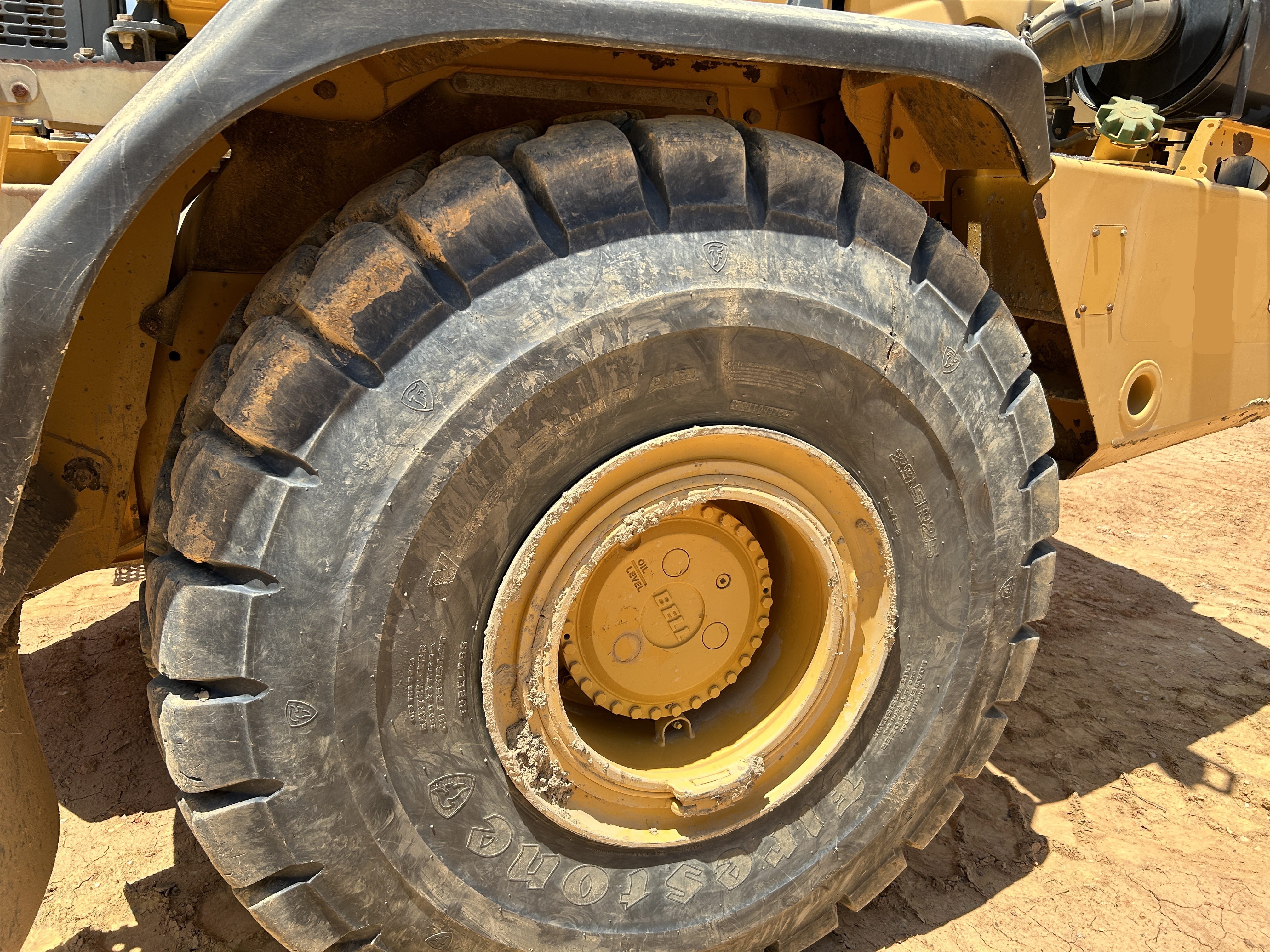 Used 2016 K-Tec K-Tec 1233 ADT scraper pulled by 2016 Bell B40D articulated dump truck