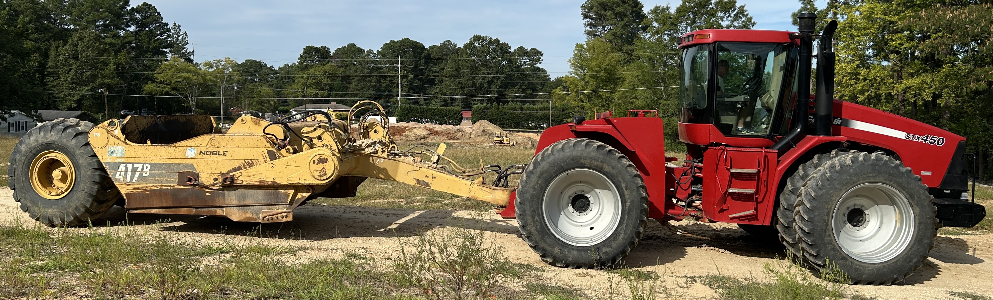 Used 2004 Case STX450 with 17 yard Noble Pull pan