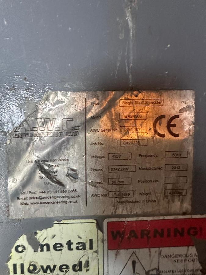 Used 2012 Genox SLow speed shredder with ram