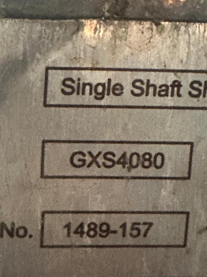 Used 2012 Genox SLow speed shredder with ram