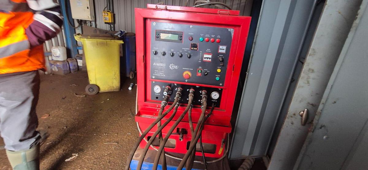 Used Container Tilter