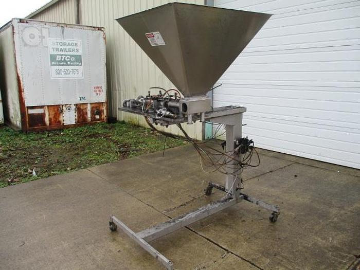 Used Hinds-Bock Dual Piston Filler;
