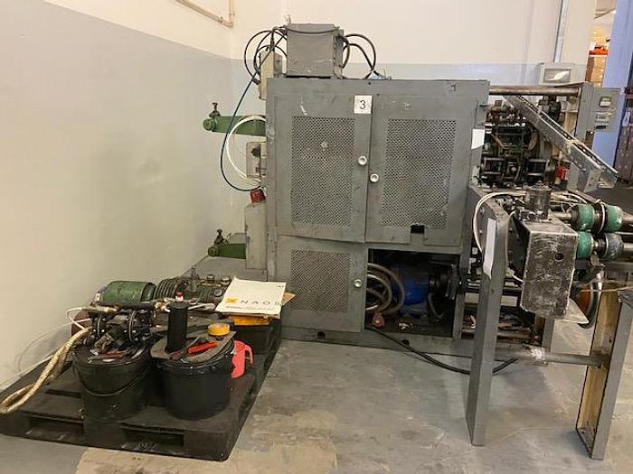 Used (visible in production) 1989 WINDMÖLLER & HÖLSCHER (W&H) T1441 - For making and attaching flat  handles to paper bags