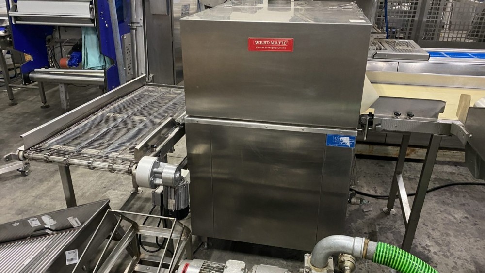 Used Webomatic vacuum line