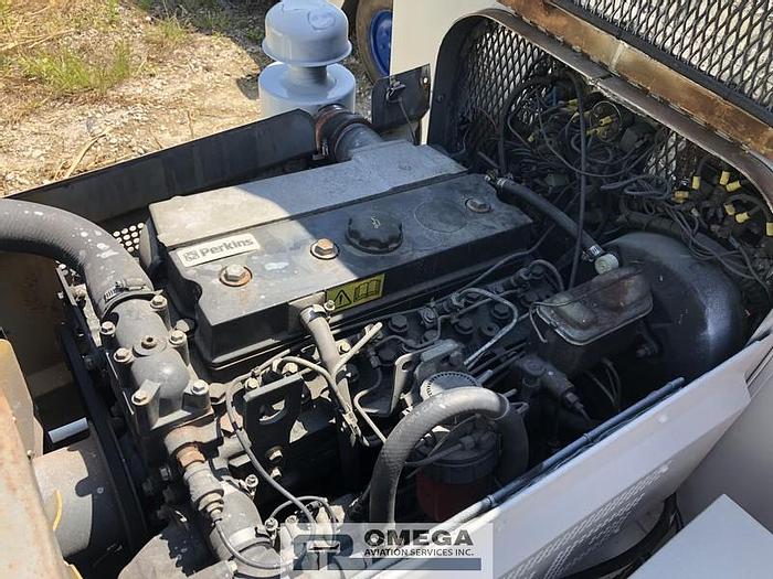 Used 1997 TUG MA50 Baggage Tractor. Diesel engine.