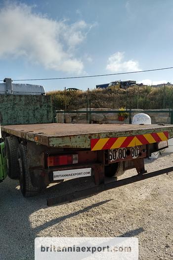 Used 1990 Iveco Turbostar 190-36 6X2 flatbed truck.