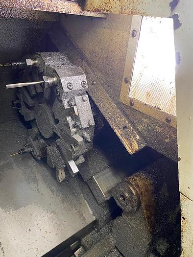 Used 2007 Haas CNC Lathe SL-10T & Servo Bar 300 Feeder