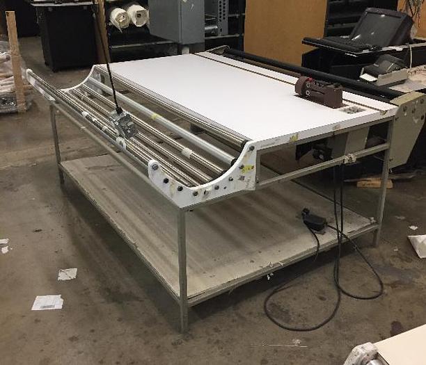 Used (2) CLOTH CUTTING TABLES