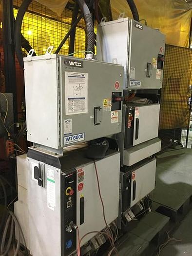 Used ABB IRBP C-1000 SPOT WELDING CELL WITH TWO ABB IRB 6640 180/2.55 ROBOTS & IRC 5 CONTROLLERS & ARO SERVO SPOT WELD GUNS