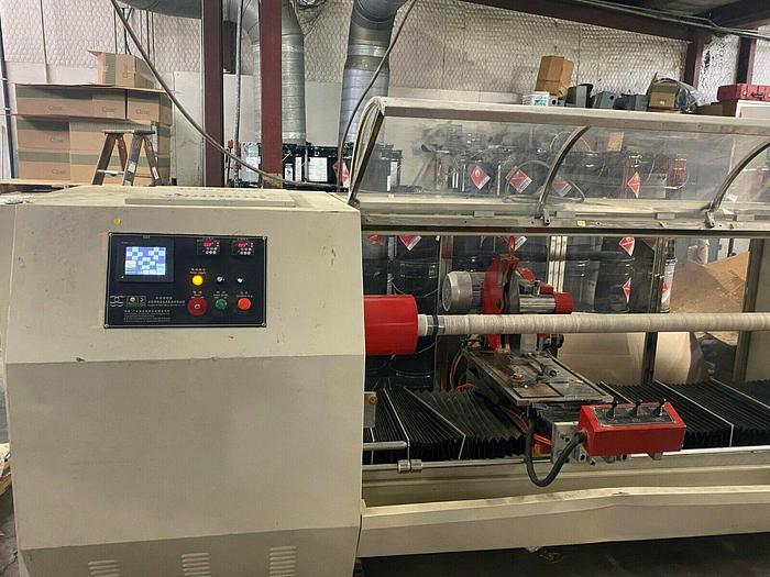 Used 62" BALONEY LOG SINGLE KNIFE SLITTER ADHEASIVE TAPES MFG 2012