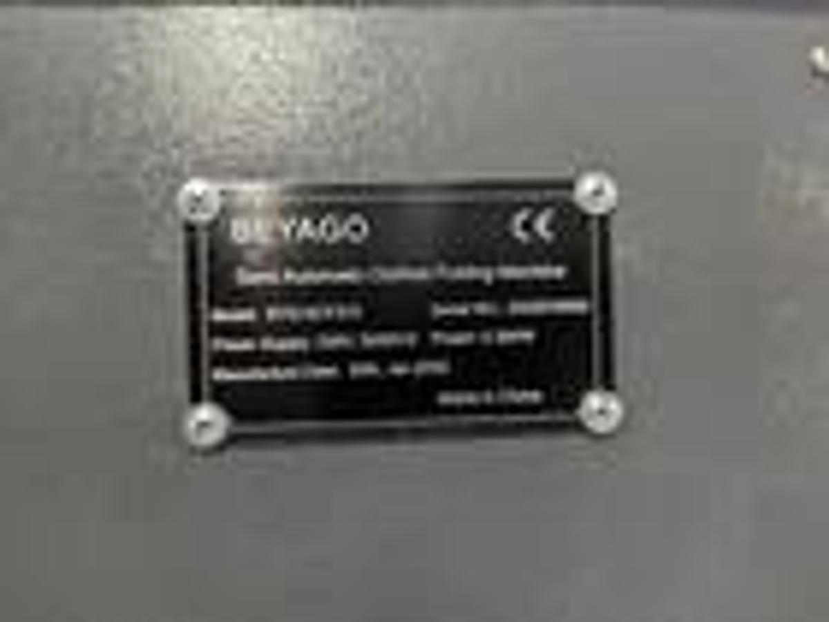 Used Beyago T-Shirt Folding Machine