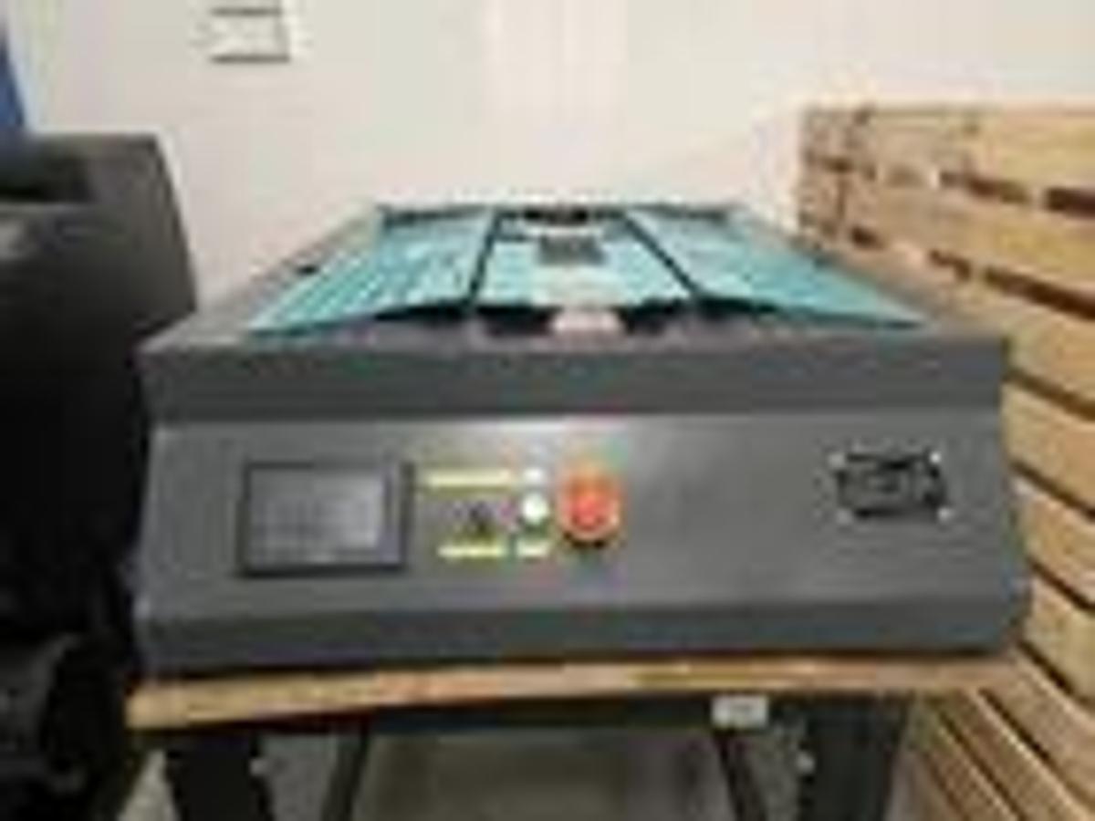 Used Beyago T-Shirt Folding Machine