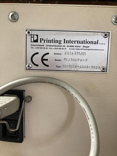 Used Printing International Saffir Platinum 90 Mounted on a height adjustable table, with integral storage cupboard.