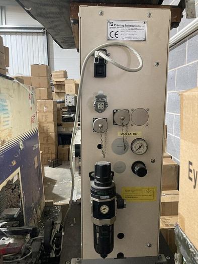 Used Printing International Saffir Platinum 90 Mounted on a height adjustable table, with integral storage cupboard.