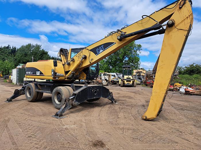 Used Caterpillar M318C MH