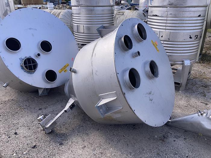 Used Used approximately 220 gallon stainless steel vertical tank