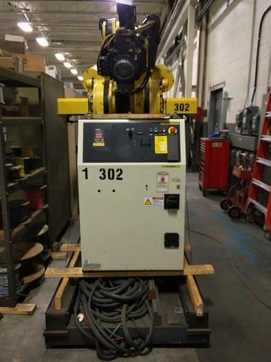Used 2012 FANUC  M900iB/700 6 AXIS CNC ROBOT WITH R30iB CONTROLLER  & 7TH AXIS 15' LONG TRACK.