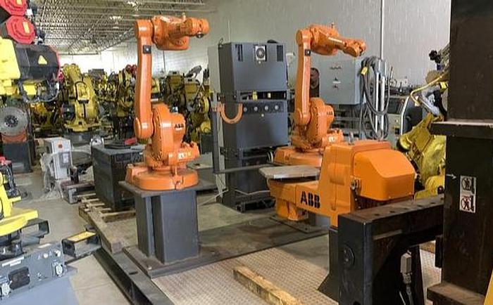 Used ABB IRB 1600-5/1.45 DUAL ARM ROBOTIC CELL WITH ABB TYPE MTC 750 POSITIONER AND IRC5 CONTROLLERS