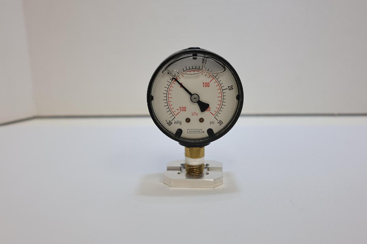 Used NOSHOK Liquid Filled Compound Pressure Vacuum Gauge -30 inHg to 30 PSI