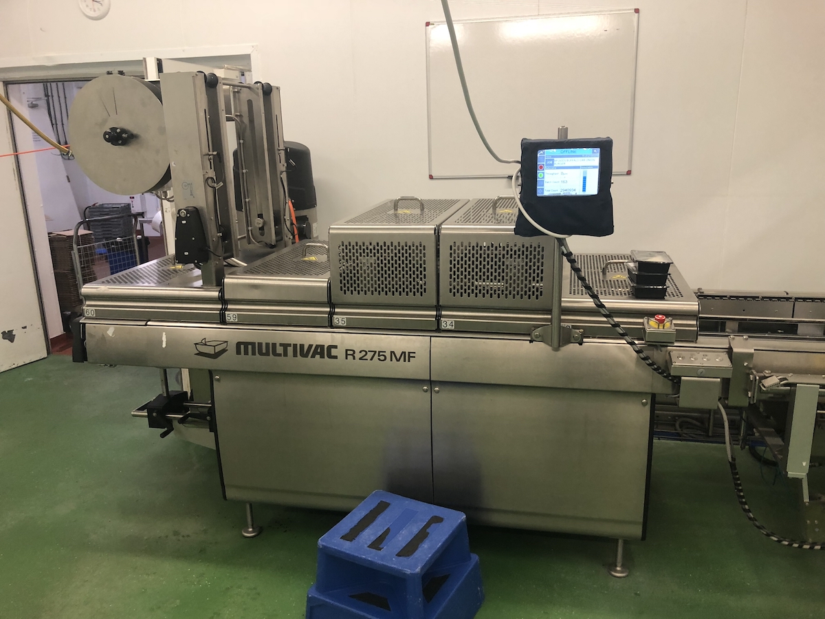 Used Multivac R275mf skin-pack thermoformer with automatic labelling machine