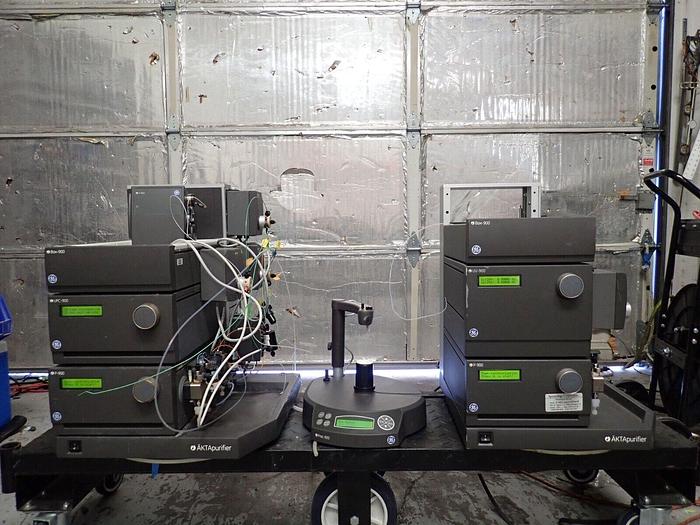 Used (2) GE AKTA Purifier FPLC Systems w/ Box-900 UPC-900 UV-900 P-900 FRAC-920 M-925