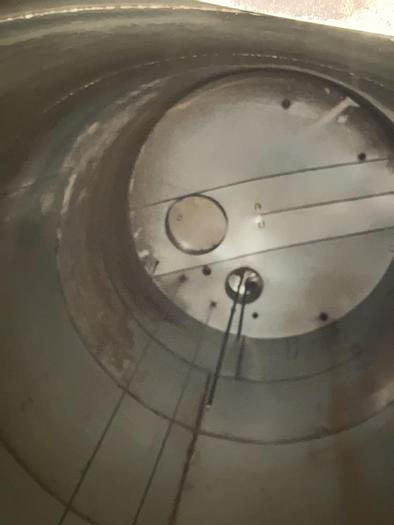Used Used approximately 11,000 gallon stainless steel vertical tank