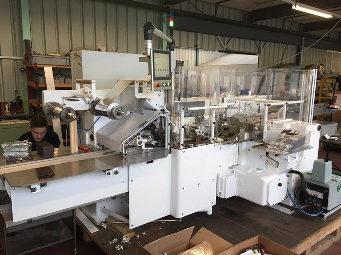 Used SIG DSN chocolate tablet wrapper