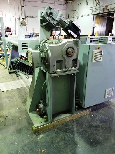 Used 64" WIDE RELIANT NON STOP TURRET REWIND WITH SPLICER 40" DIAMETER