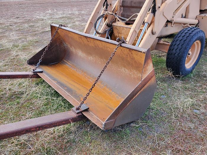 Used Case 580SE Backhoe w/ Attachments