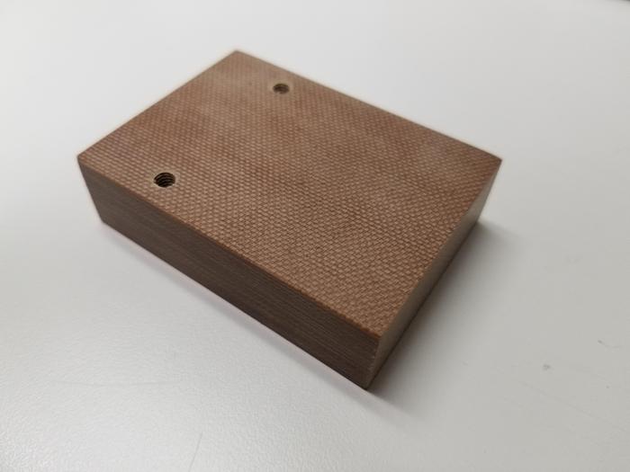Used Pistorius 2.75" x 2" x .75" Phenolic Fence Block with 2 tapped holes, includes two Socket Head Cap Screws