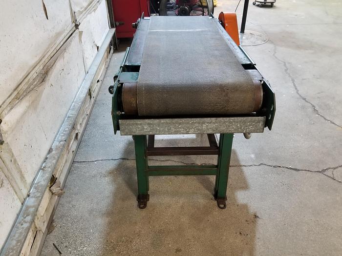 Used 4Ft Heavy Duty Powered Conveyor, Forward, Reverse, Easy Belt adjustment, Cleaned, Checked,