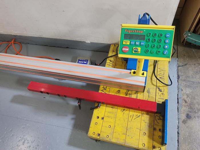 Used Tigerstop TS20, 20 foot capacity automated digital stop / pusher, 110V, 1PH, Cleaned, Checked