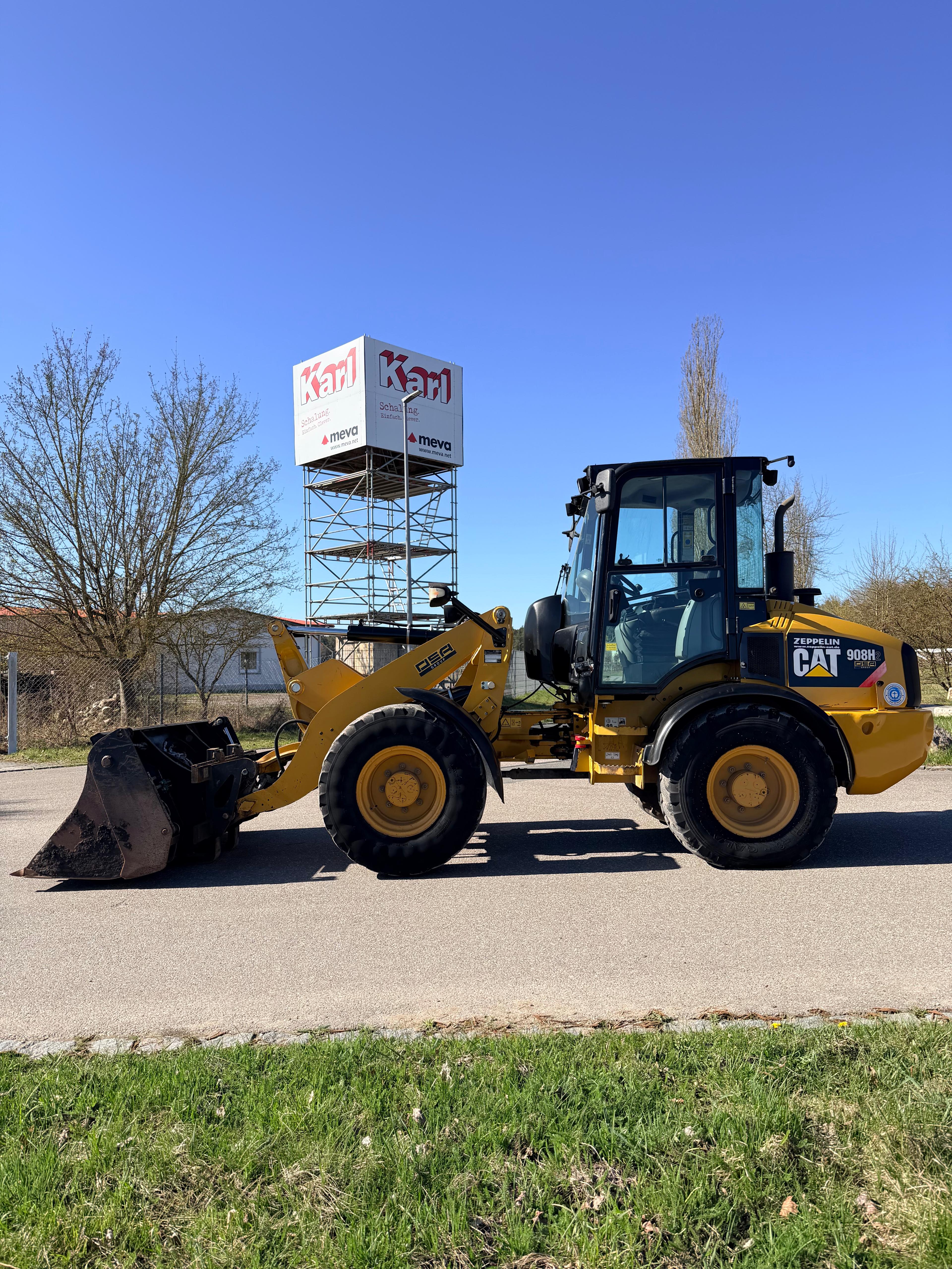 Gebraucht CAT 908H2 inkl.Klappschaufel und Palettengabel