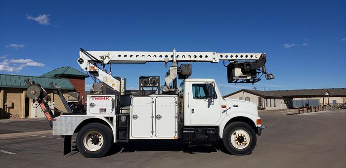Used 1999 International 4900 T40D Cable Placer Bucket Truck