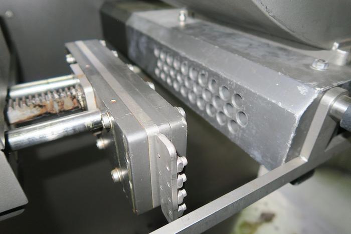 Used Hacos Depositor for chocolate or cream centres