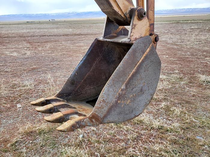 Used Case 580SE Backhoe w/ Attachments