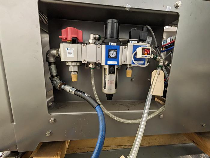 Used Combi Alphapack Case Packer and sealer (Never used) New 2019