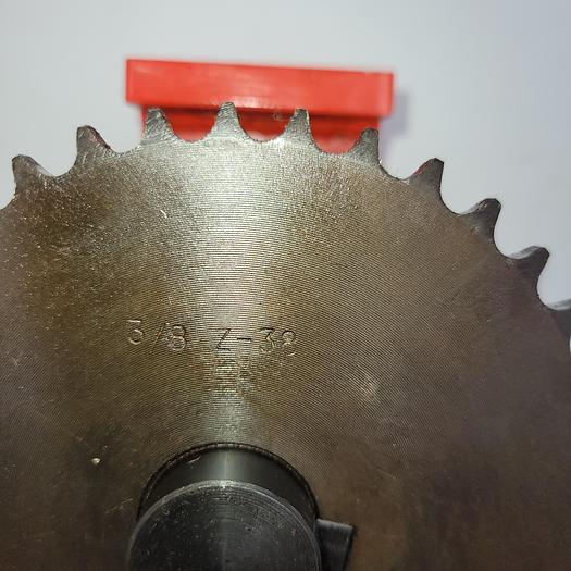 Used Steel "U" housing 4" x 2.5" (1013190100001013) connected with chain 3/8" Z - 38 sprocket Total width = 5.5"