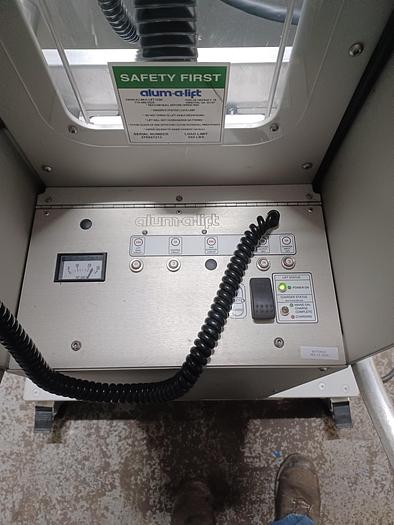 Used Citus jacketed mixing kettle and Alum-a-lift lifting cart