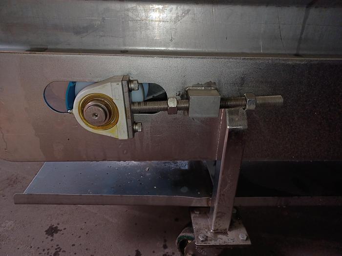 Used Stainless incline conveyor 11' long 12" wide discharge end 6' tall indeed 30" tall 