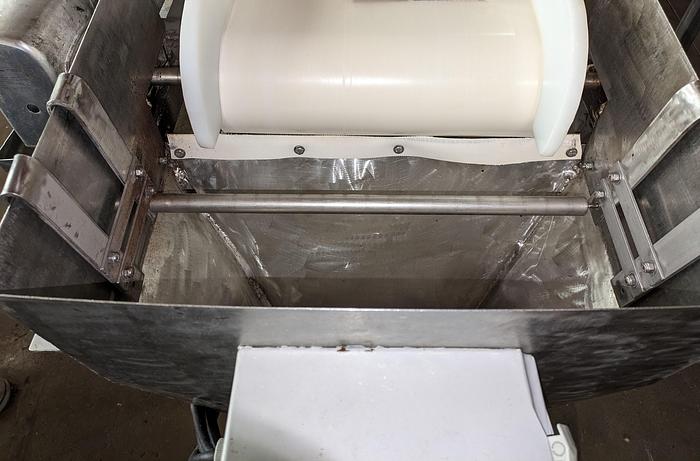 Used conveyor, stainless steel frame, 18" wide 21' long PVC belt adjustable leg with casters.