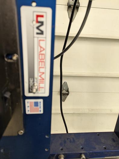 Used printer/labeler label mill 3605 and zebra ZE 500