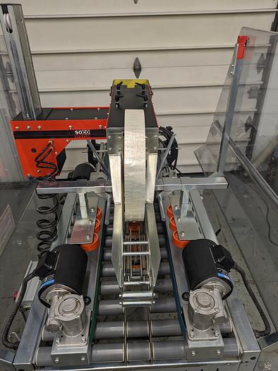 Used soco T400 auto flap closer case sealer with infeed conveyor