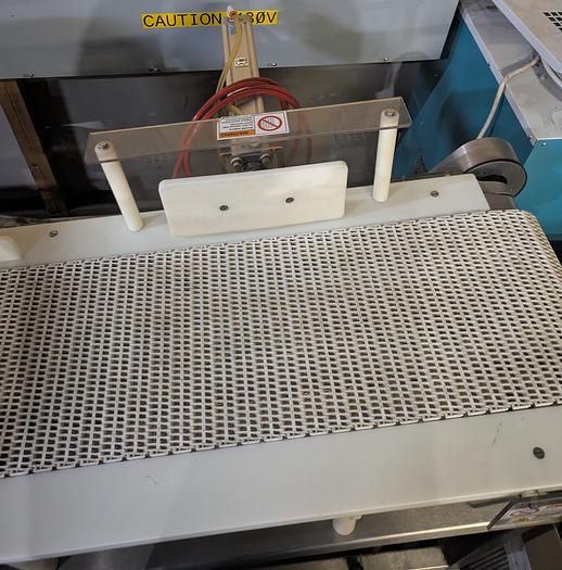 Used Safeline metal detector, 12 1/4" tall x 13 3/4" wide, Stainless conveyor, pne2013umatic reject