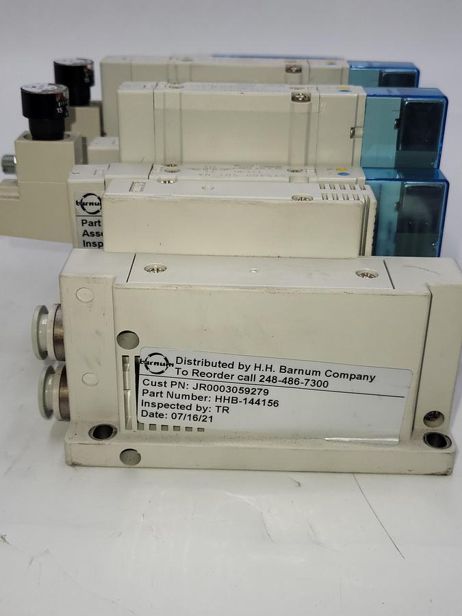 Used SMC HHB-144156 W/ 7 solenoids SY5300 & Two SY5400 air regulated / One: EX260-SIL1 Serial Transmission System output
