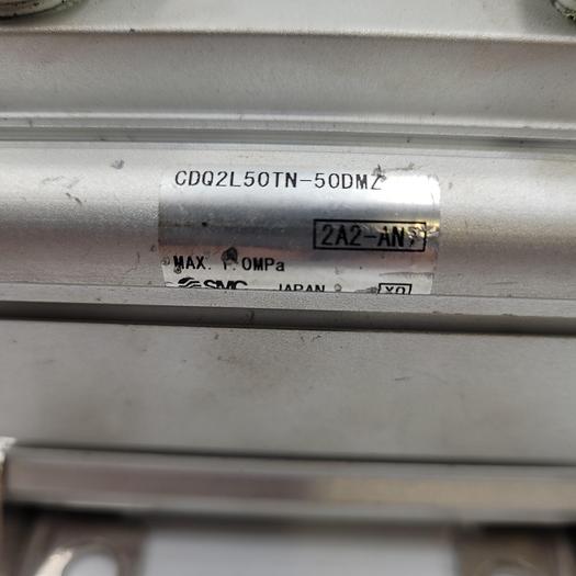 Used SMC pneumatic cylinder CDQ2L50TN-50DMZ / 2AQ2-AN7 w/ brackets & cylinder head
