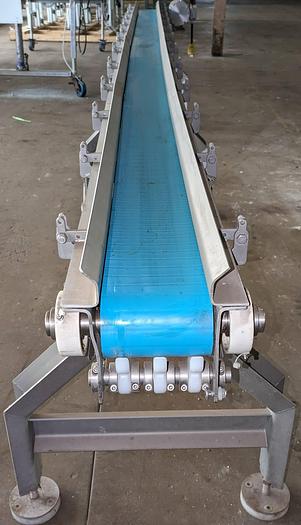 Used conveyor, stainless steel frame, 6" wide 15' long intralox belt adjustable feet flip up rails